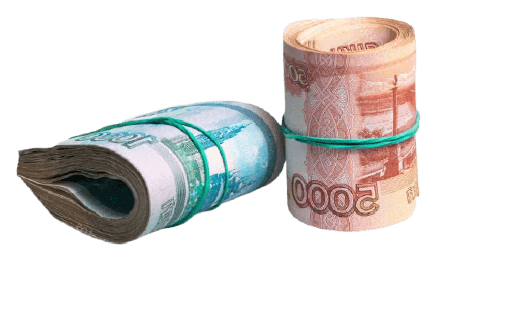 свернутые купюры одна и пять тысяч рублей