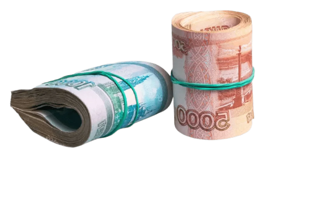 свернутые купюры одна и пять тысяч рублей